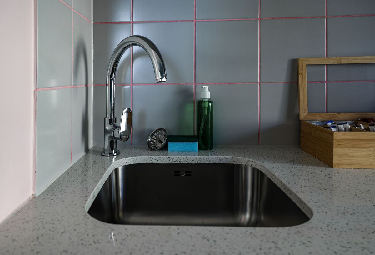 Modern bathroom plumbing installation during renovation in Calgary