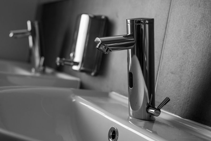 BPR Mechanical technician installing plumbing during a bathroom renovation