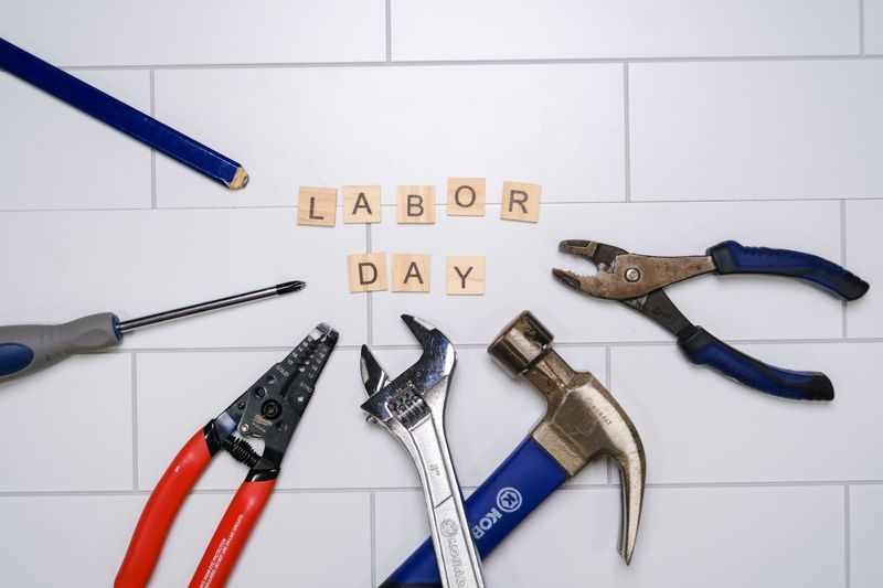 Calgary plumber installing a bathroom faucet with professional tools
