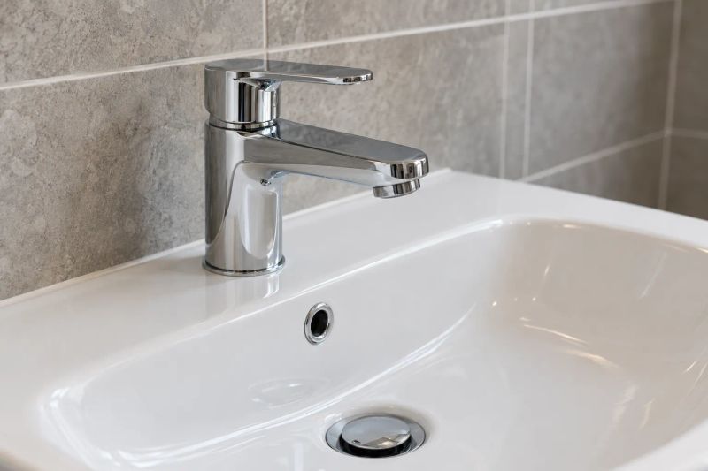BPR Mechanical Ltd plumber repairing residential plumbing for a Westgate home in Calgary